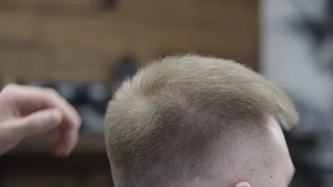 Barber making haircut using machine Stock Footage 88442896