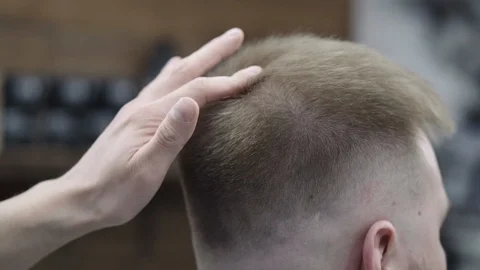 Barber making haircut using machine Stock Footage 88443087