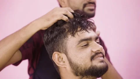 Barber nuckle cracking customer head Stock Footage 162533669