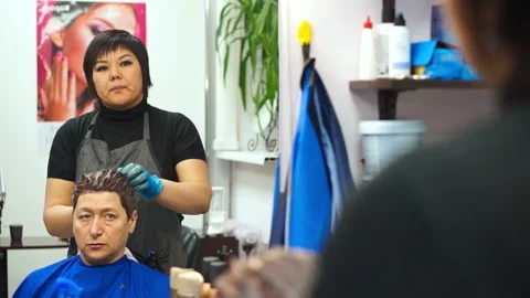 The Barber operates and laughs Stock Footage 88471108