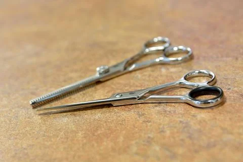 Barber - point of view. Comb, scissors on the table close-up. Stock Photos