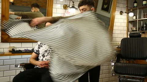 Barber preparing client Stock Footage 91216090