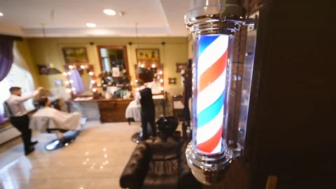 Barber s Pole close-up on the background of barbershop Stock-Footage 104412628