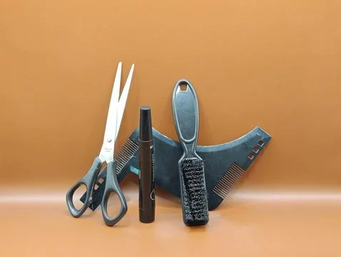 Barber scissors and comb Stock-Fotos
