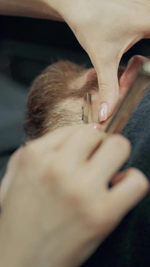 Barber Shaving Client Neck With Straight Razor Stock-Footage 336782414