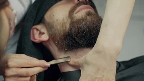 Barber Shaving Client Neck With Straight Razor 스톡 동영상 337022211