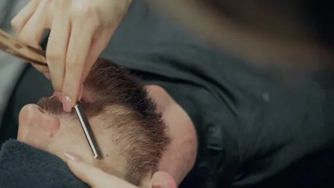 Barber Shaving Client Neck With Straight Razor Stock-Footage 340068843