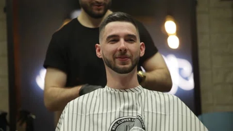 Barber Start His Work With Customer Stock Footage 139765342