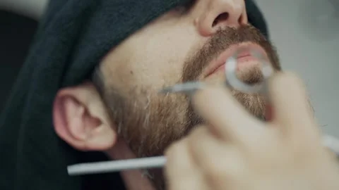 Barber Trimming Client Beard With Scissors 動画素材 341600199