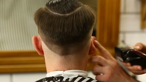 Barber using haircutter Stock Footage 91214959