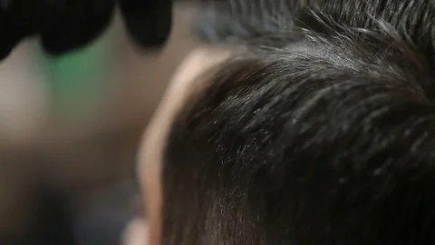 Barber using scissors and comb Stock Footage 83143182