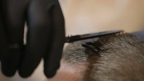 Barber using scissors and comb Stock Footage 83143200