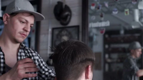 Barber water sprays client head Stock Footage 62948385