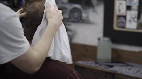 Barber wipes his head Stock Footage 88144471