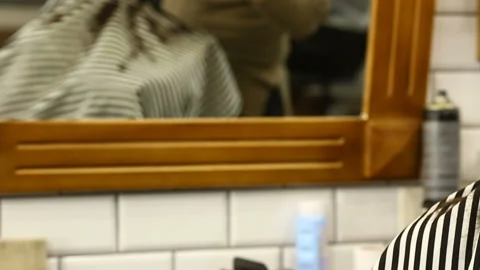 Barber working with trimming machine Stock Footage 91215138