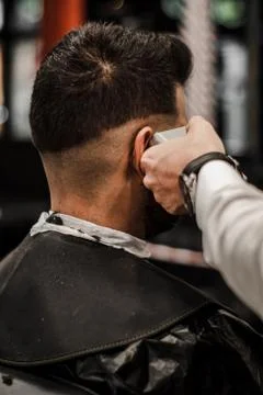 Barber's hand making a gradient Stock Photos