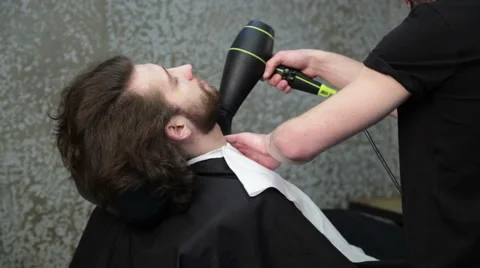 Barber's hands are drying man's beard Stock Footage 62979893
