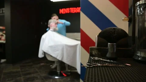 Barber's tools in focus, in the background out of focus barber Stock Footage 153481738