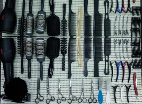 Barber's work table with a set of scissors Stock Photos