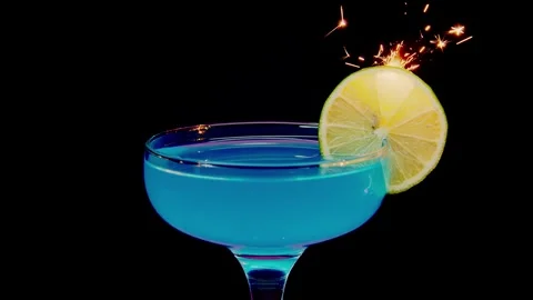 Barbie cocktail. barbie core. Professional barman decorates a blue cocktail with Stock Footage 246977341