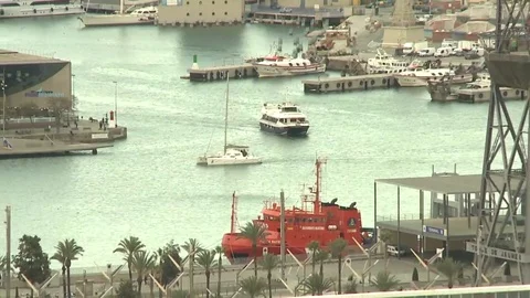 Barcelona bay sea harbour pan following ship Stock Footage 73290590