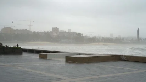 Barcelona beach during a storm, view from the pier. Huge sea waves Vídeos de archivo 123318308