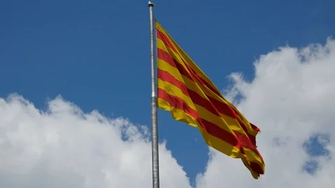 Barcelona Catalan Flag waving in Clouds Slow Motion Cataluyna Spain Stock Footage