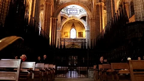 Barcelona Cathedral Interior view -  Main Nave - Tilt Move - Worshippers Video stock 89906837