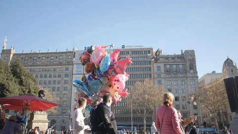 Barcelona DECEMBER 23rd 2016 Crowd people shopping hellium balloons city 4k Stock Footage 73183283