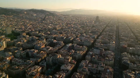Barcelona Eixample residential district and Sagrada Familia Basilia at sunrise Video stock 209965791