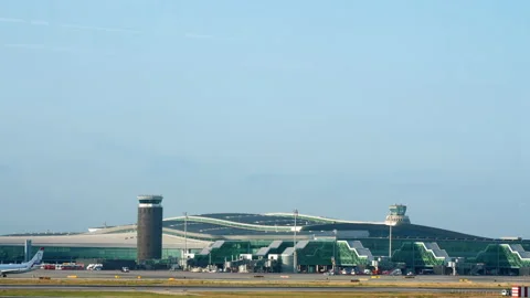Barcelona International Airport. View from the Taxiway. Exterior day. A plane Stock Footage