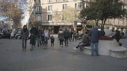 Barcelona, January 3rd 2017: Anonymous crowd of people walking on zebra crossing Stock Footage 73204967