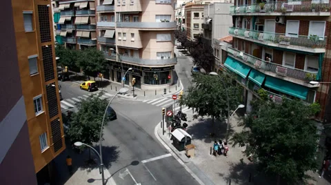 BARCELONA - JUNE 13: Time lapse of cars and pedestrians at the intersection on J Stock Footage 34862907
