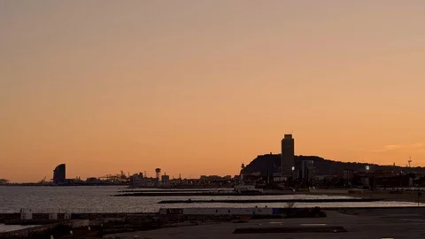 Barcelona panoramic view from seaside at sunset, golden hour Stock Footage 124711637