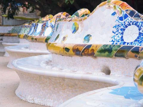 Barcelona, Spain - august 2019: pattern of multicolour mosaic on seats, medium 스톡 사진