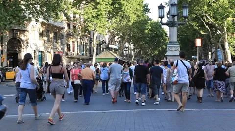 BARCELONA.SPAIN-2013: People walking  down the La Rambla street Stock Footage 49072347