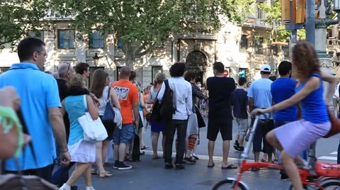 BARCELONA.SPAIN-2013: People walking  down the La Rambla street Stock Footage 49072401