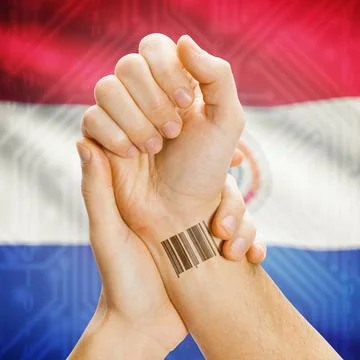 Barcode ID number on wrist and national flag on background - Paraguay Barc... Stock Photos