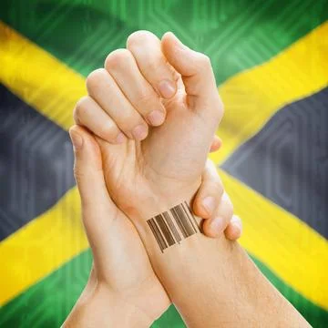 Barcode ID number on wrist and national flag on background - Jamaica Barco... Stock Photos