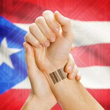 Barcode ID number on wrist and national flag on background - Puerto Rico B... Stock Photos
