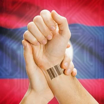 Barcode ID number on wrist and national flag on background - Laos Barcode ... Stock Photos