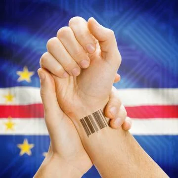 Barcode ID number on wrist and national flag on background - Cape Verde Ba... Stock Photos