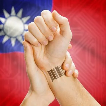 Barcode ID number on wrist and national flag on background - Taiwan Barcod... Stock Photos