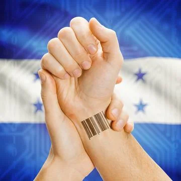 Barcode ID number on wrist and national flag on background - Honduras Barc... Stock Photos