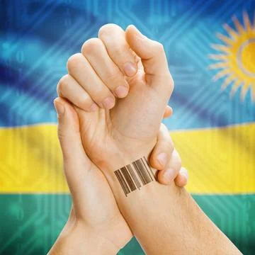 Barcode ID number on wrist and national flag on background - Rwanda Barcod... Stock Photos