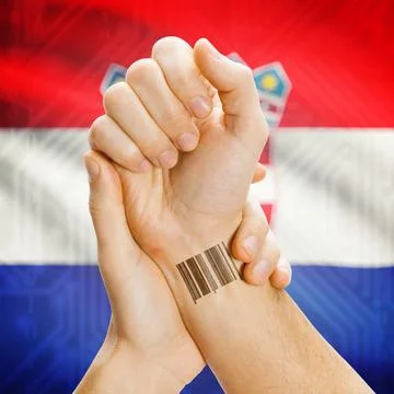 Barcode ID number on wrist and national flag on background - Croatia Barco... Stock Photos