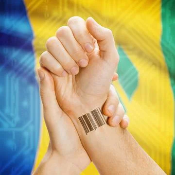Barcode ID number on wrist and national flag on background - Saint Vincent... Stock Photos
