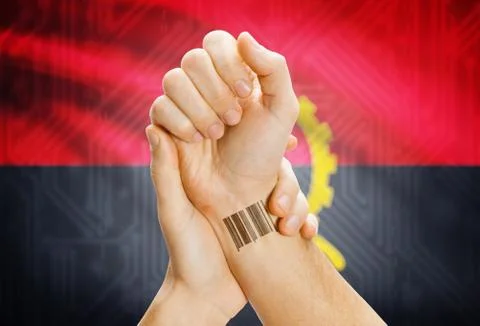 Barcode ID number on wrist of a human and national flag on background - Angol 스톡 사진
