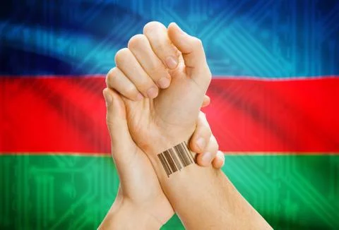 Barcode ID number on wrist of a human and national flag on background - Azerb 库存照片