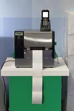 Barcode Label Printer and Scanner for Distribution Warehouse Barcode Label... Stock-Fotos